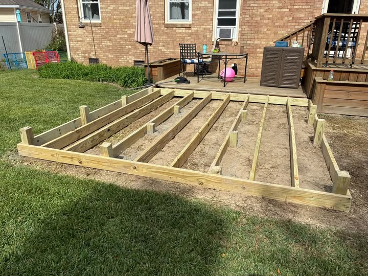 Deck frame with joists set on the lawn