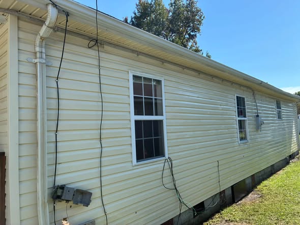 Long side wall of a home after washing